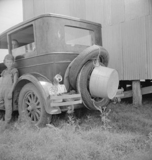 Migrant family's car near Brownsville, Texas, 1936. Creator: Dorothea Lange.