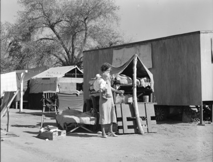 Tubercular mother from Oklahoma now living in the Kern migrant camp (resettlement), CA, 1936. Creator: Dorothea Lange.
