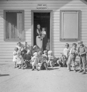 While the mothers are working in the fields, the preschool children..., Kern migrant camp, 1936. Creator: Dorothea Lange.