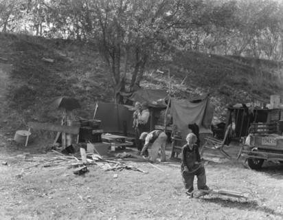 Destitute family, American River camp, near Sacramento, California., 1936. Creator: Dorothea Lange.