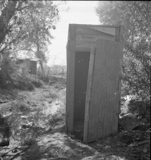 Privy in cotton camp for migratory workers, California, 1936. Creator: Dorothea Lange.