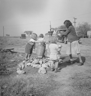 Water supply, Migratory camp for cotton pickers, San Joaquin Valley, California, 1936. Creator: Dorothea Lange.