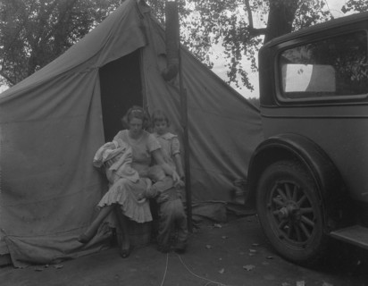 Mother and three children in a California squatter camp, 1936. Creator: Dorothea Lange.