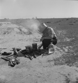 Along a California highway, a dust bowl refugee bound for Oregon, 1937. Creator: Dorothea Lange.