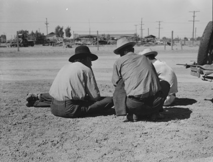 Oklahomans now working or looking for work in the pea harvests of California, Imperial Vallery, 1937 Creator: Dorothea Lange.