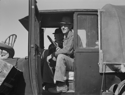 Texas family looking for work in the carrot harvest, California, 1937. Creator: Dorothea Lange.