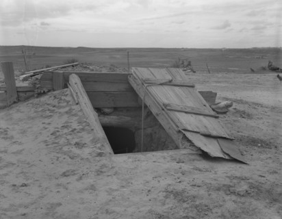 Storm cellar on the Texas plains, West Texas Panhandle, 1937. Creator: Dorothea Lange.