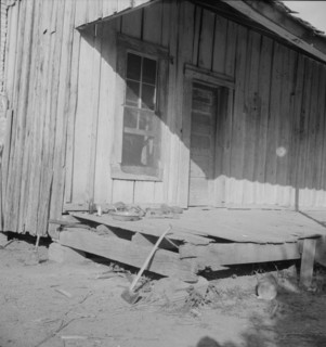 Sharecropper's cabin, Mississippi, 1937. Creator: Dorothea Lange.