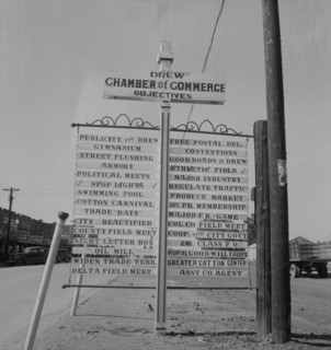Chamber of Commerce sign, Drew, Mississippi, 1937. Creator: Dorothea Lange.