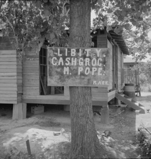 Mississippi grocery store, 1937. Creator: Dorothea Lange.