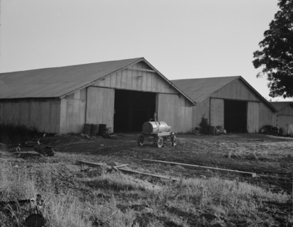 Tractor garage at the Aldridge Plantation near Leland, Mississippi, 1937. Creator: Dorothea Lange.