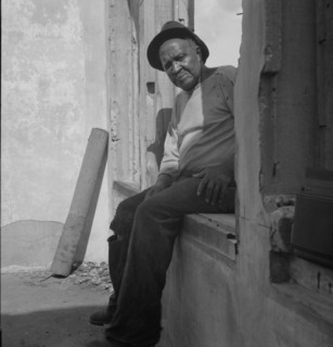 The one inhabitant remaining in Fullerton, Louisiana, an abandoned lumber town, 1937. Creator: Dorothea Lange.