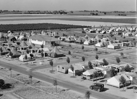 Farm Security Administration camp for migrant agricultural workers at Shafter, California, 1938. Creator: Dorothea Lange.