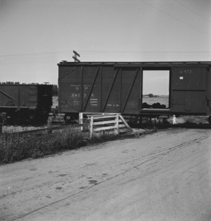 Itinerant laborers riding the freight, West side of San Joaquin Valley, California, 1938. Creator: Dorothea Lange.