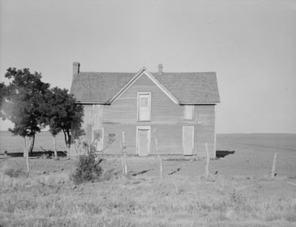 Vacant farmhouse in area of mechanization and drought near Olustee, Oklahoma, 1938. Creator: Dorothea Lange.