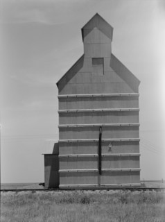 Grain elevator on the Texas Panhandle plains, Everett, Texas, 1938. Creator: Dorothea Lange.