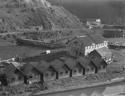 Abandoned lumber town showing mill and houses, Mendocino County, California, 1938. Creator: Dorothea Lange.