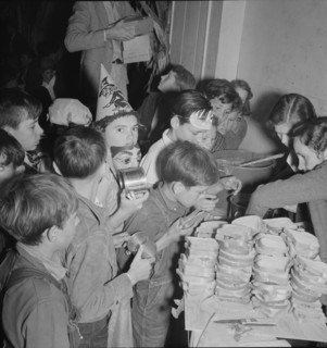 The children at Halloween party in Shafter migrant camp, California, 1938. Creator: Dorothea Lange.