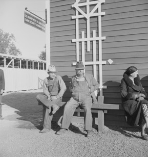 Lineup outside of Farm Security Administration grant office early in the morning, Tulare, CA, 1938. Creator: Dorothea Lange.