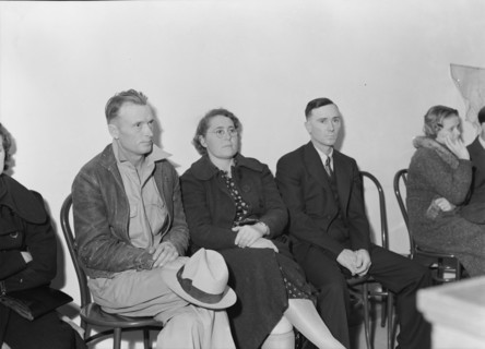 Night meeting in the FSA office, Tulare County, California, 1938. Creator: Dorothea Lange.