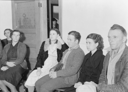 Night meeting in the FSA office, Tulare County, California, 1938. Creator: Dorothea Lange.