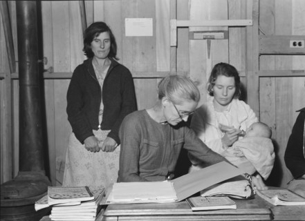 Meeting of the Mothers' Club in Arvin camp for migrant workers, Kern County, 1938. Creator: Dorothea Lange.