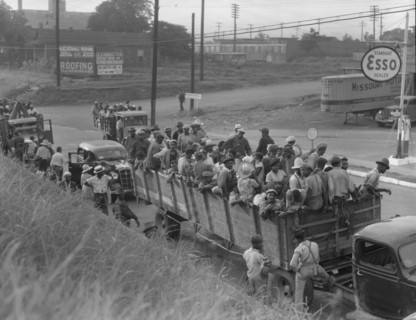 Cotton hoers loading at Memphis, Tennessee for the day's work in Arkansas, 1937. Creator: Dorothea Lange.