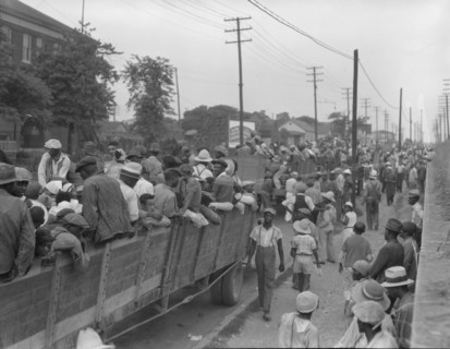 Cotton hoers loading at Memphis, Tennessee for the day's work in Arkansas, 1937. Creator: Dorothea Lange.