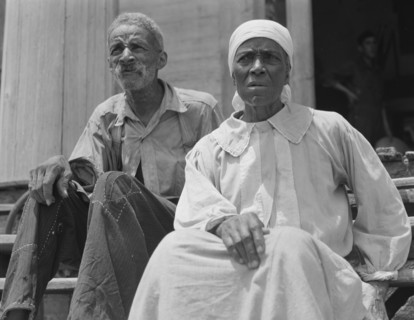 Ex-slave and wife who live in a decaying plantation house, Greene County, Georgia, 1937. Creator: Dorothea Lange.