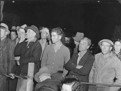 Street meeting at night...outside of Shafter, California, 1938. Creator: Dorothea Lange.