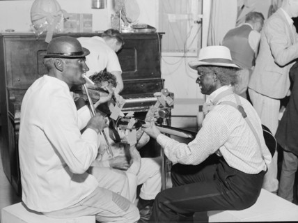 Halloween party at Shafter camp for migrants, California, 1938. Creator: Dorothea Lange.