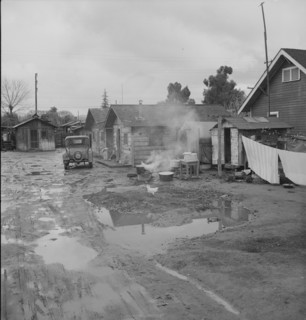 Houses inhabited by Mexican citrus workers, Lindsay, Tulare County, California, 1939. Creator: Dorothea Lange.