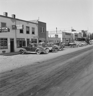 Looking down main street of a frontier town..., Tulelake, Siskiyou County, California, 1939. Creator: Dorothea Lange.