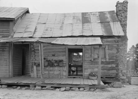 Negro sharecropper house on dirt, near Olive Hill, North Carolina, 1939. Creator: Dorothea Lange.