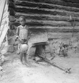 Possibly: Grandchildren of tobacco sharecropper down at barns, Wake County, North Carolina, 1939. Creator: Dorothea Lange.