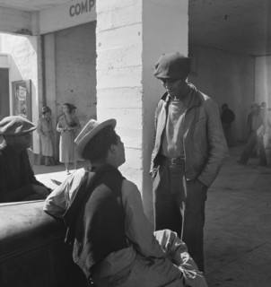 Outside the FSA grant office during the pea harvest, Calipatria, California  1939. Creator: Dorothea Lange.