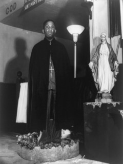 Reverend Vondell Gassaway, pastor of the St. Martin's Spiritual Church..., Washington, D.C., 1942. Creator: Gordon Parks.