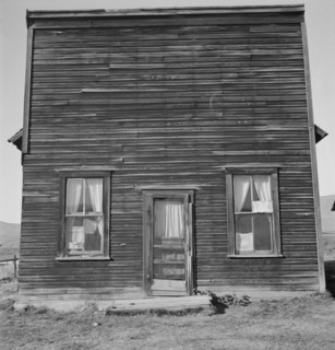 Member of Ola self help sawmill co-op..., "Jacknife Saloon", Gem County, Idaho, 1939. Creator: Dorothea Lange.