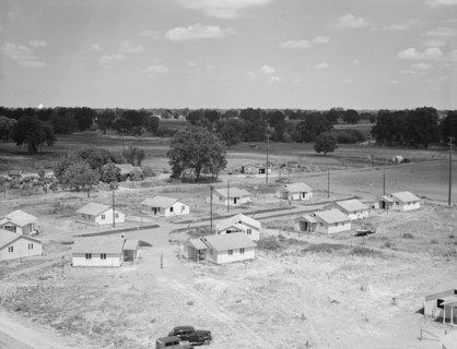 Partially completed homes for agricultural workers..., Farmersville, California, 1939. Creator: Dorothea Lange.