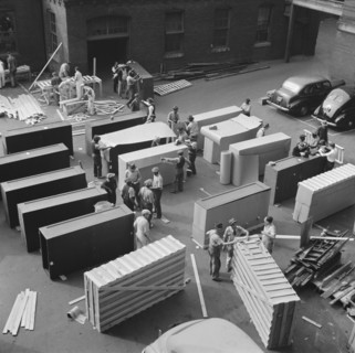 Possibly: United States government workers and carpenters making crates..., Washington, D.C., 1942. Creator: Gordon Parks.
