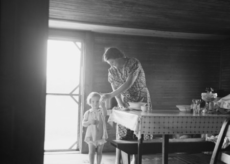 Wife and child of tobacco sharecropper, Person County, North Carolina, 1939. Creator: Dorothea Lange.