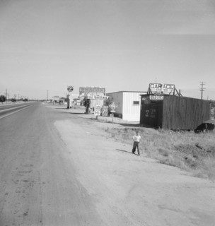 Along the highway U.S. 99 at Highway City, between Tulare and Fresno, California, 1939. Creator: Dorothea Lange.