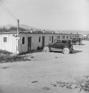 Ten cabins which rent for ten dollars..., Arkansawyers...camp, Greenfield, Salinas Valley, CA, 1939. Creator: Dorothea Lange.