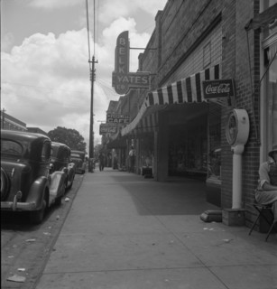 The main street, Fayetteville Street, of Siler City, North Carolina, 1939. Creator: Dorothea Lange.