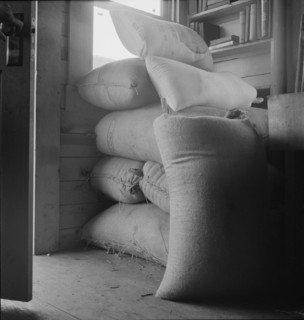 Possibly: Interior of farmer's two-room log home, FSA borrower, Boundary County, Idaho, 1939. Creator: Dorothea Lange.