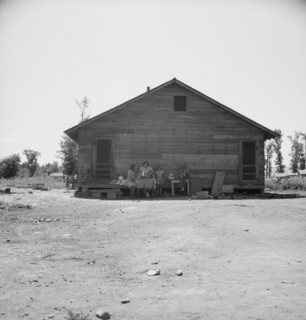 Home of family living in Sumac Park, shacktown community...Yakima, Washington, 1939. Creator: Dorothea Lange.