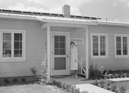 Resident nurse and clinic, FSA camp, Farmersville, Tulare County, California, 1939. Creator: Dorothea Lange.