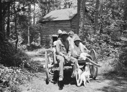 Colored sharecropper and his children about to leave..., Shoofly, North Carolina, 1939. Creator: Dorothea Lange.