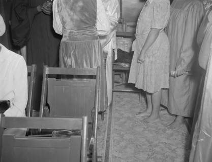 As in Moses' time, members of the St. Martin's Spiritual Church remove...Washington, D.C., 1942. Creator: Gordon Parks.
