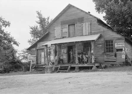 Country store on dirt road, Sunday afternoon, near Gordenton, North Carolina, 1939. Creator: Dorothea Lange.